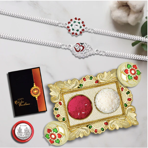 Silver Rakhi Combo Set – 2 Designer Rakhis with Silver Coin, Roli Chawal & Chocolate Gift