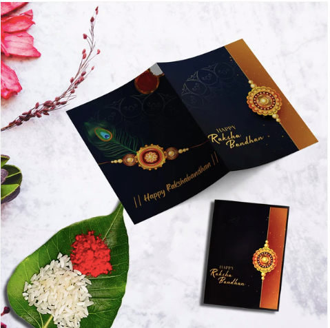 Silver Rakhi Combo Set – 2 Designer Rakhis with Silver Coin, Roli Chawal & Chocolate Gift