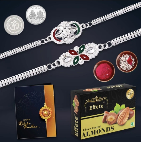 Raksha Bandhan Gift Combo – 2 Stylish Rakhis with Silver Coin, Chocolates & Pooja Kit