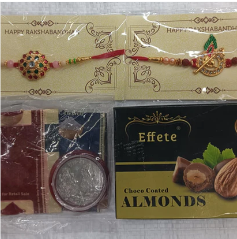 Traditional Rakhi Combo – 2 Designer Rakhis with Choco Almonds, Silver Coin & Pooja Kit