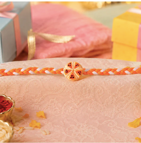 Orange Slice Charm Designer Rakhi – Cute Fancy Dori Rakhi for Brother