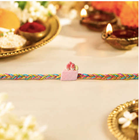 Strawberry Cake Charm Designer Rakhi – Cute Fancy Dori Rakhi for Brother